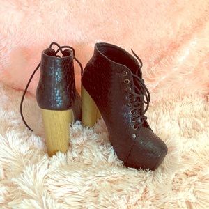 Woven black booties with wood like heels
